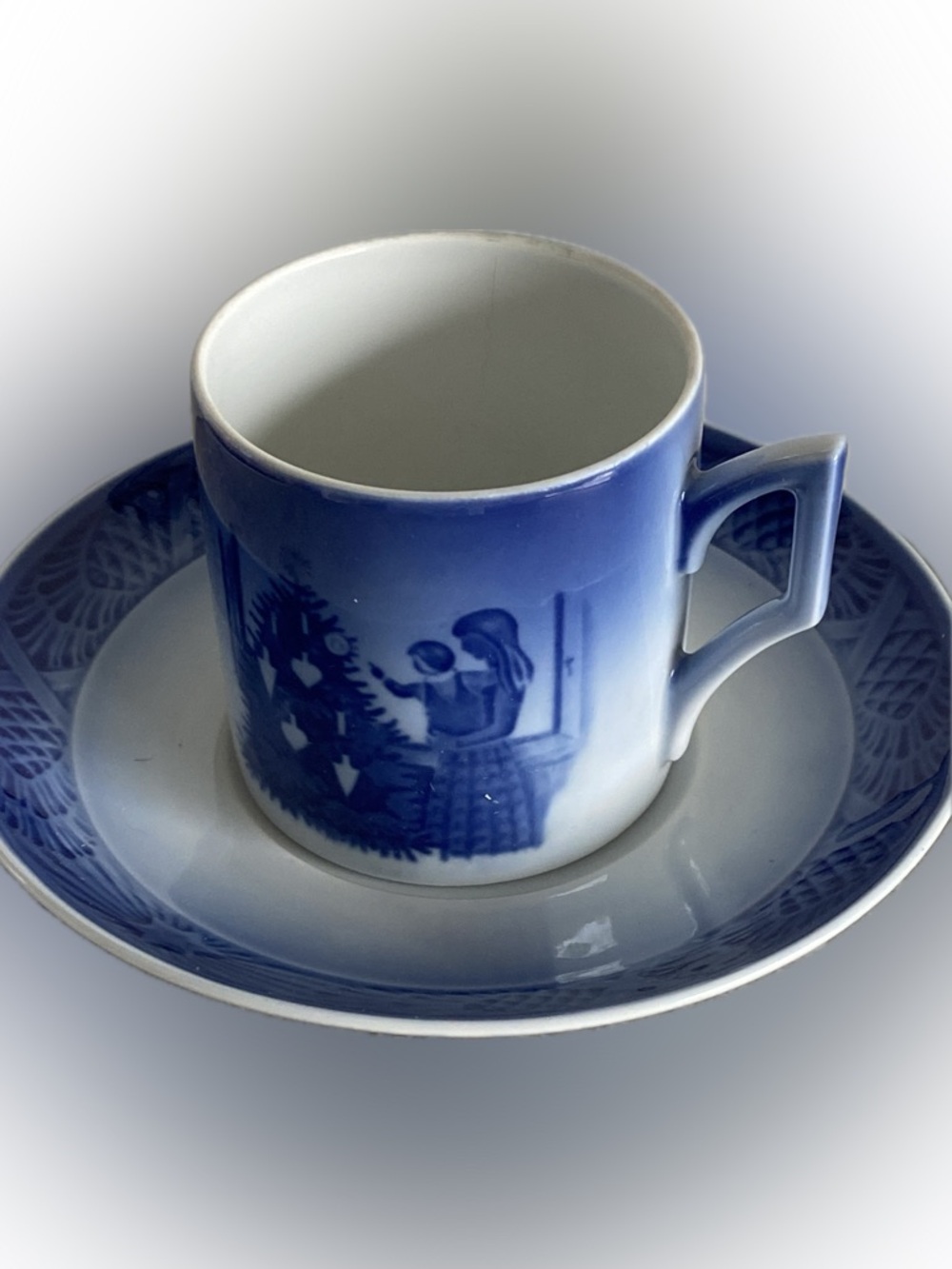 Royal Copenhagen Blue and White Porcelain teacup and Saucer  admiring tree